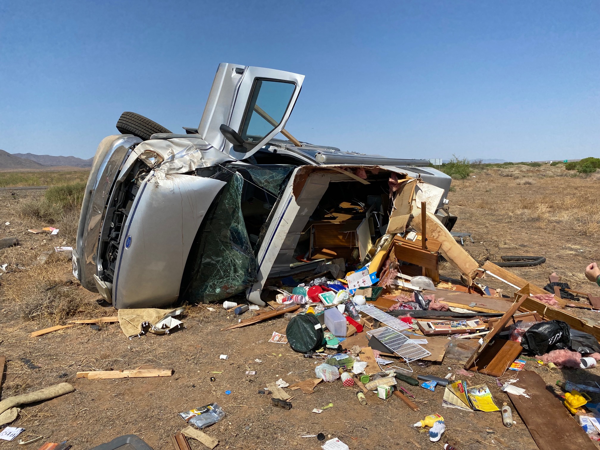 In the median on the driver's side. Note the debris field.